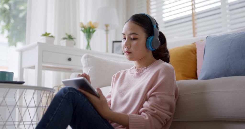 Young teen listening to music
