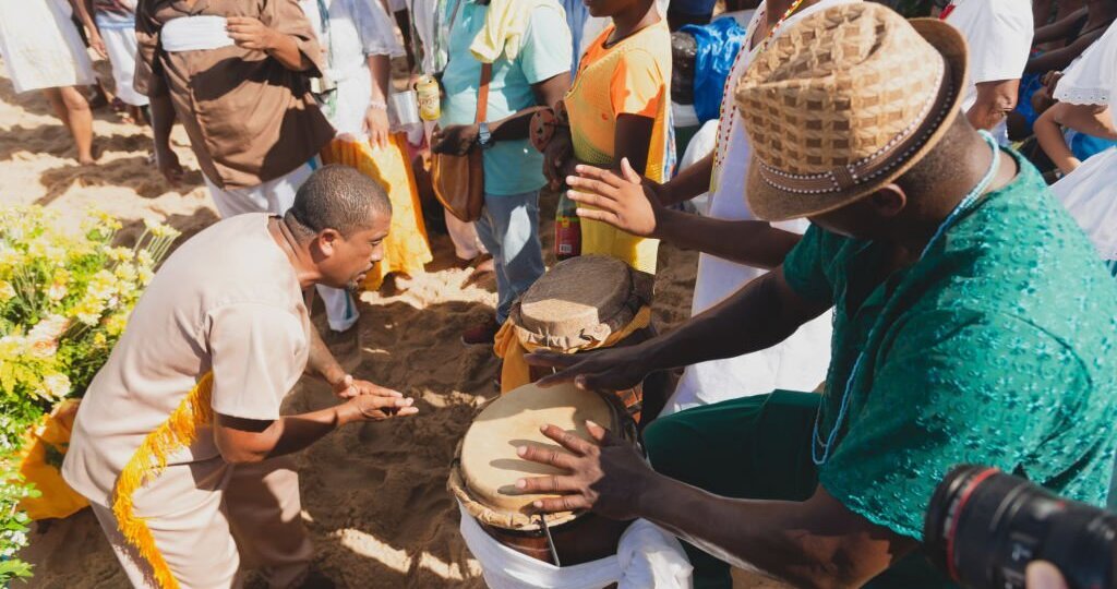 Members of Camdonble are seen dancing and playing during tributes to Iemanja 