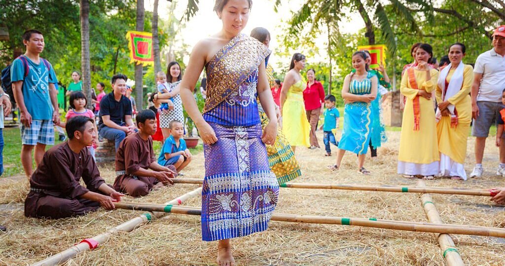 A girl was bamboo dancing in the culinary fair at the Van Thanh tourist area, Ho Chi Minh City