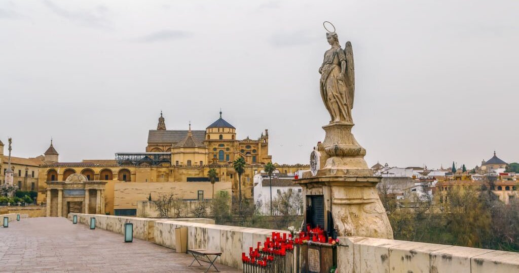 Sculpture of St. Raphael on Roman bridge in Cordoba, Spain