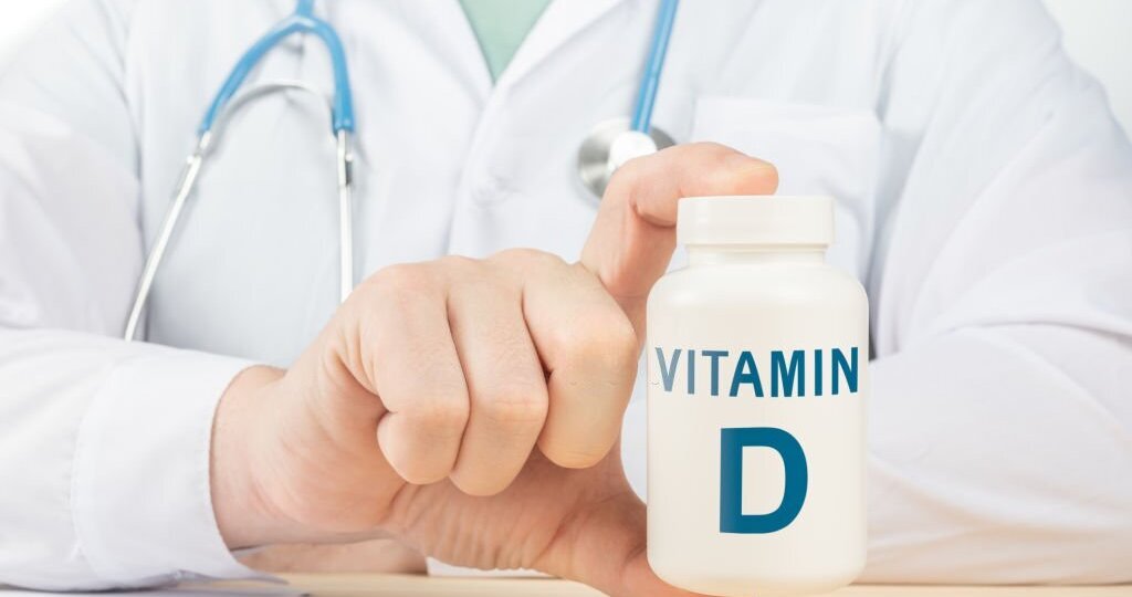 Vitamin D and supplements for human health. Doctor recommends taking vitamin D. doctor talks about Benefits of vitamin D. Essential vitamins and minerals for humans. D Vitamin Health Concept.