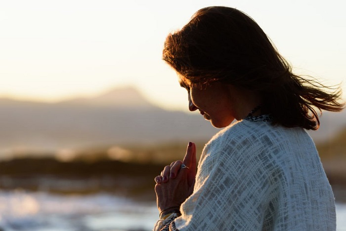 Woman looking at the sea in a relaxation moment in Mallorca, Balearic Islands