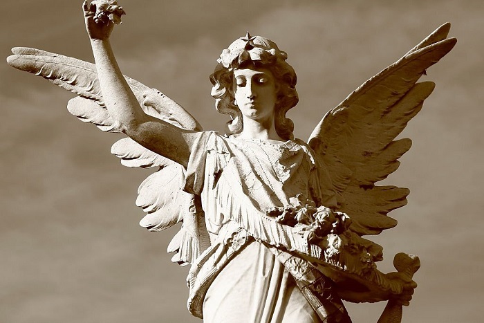 Beautiful powerful Madonna Angel offering hope, Recoleta cemetery, Buenos Aires