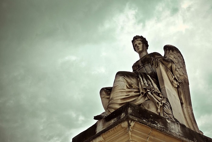 Goddess Statue with Clouds background