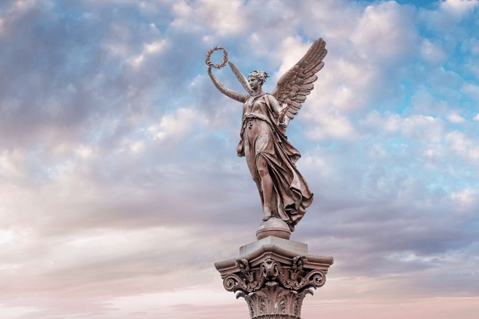 The statue of the Muse or angel near Rudolfinum building in Prague