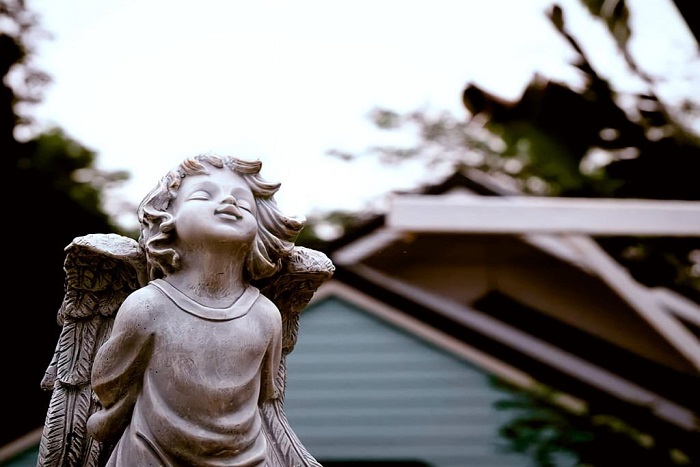 Little angel statue  in front of a public park in Chiang Rai