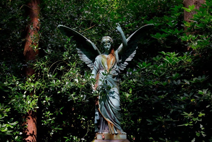 Ancient angel sculpture at the worlds biggest cemetery, Hamburg, Germany
