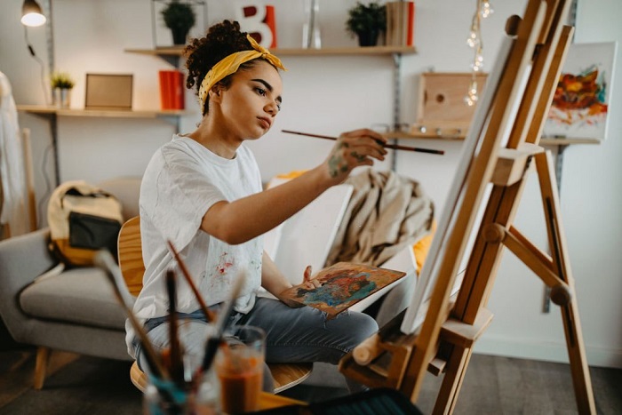 Photo of Eliana an artist in her apartment