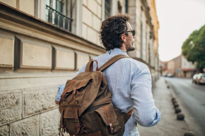 Samuel walking in the city