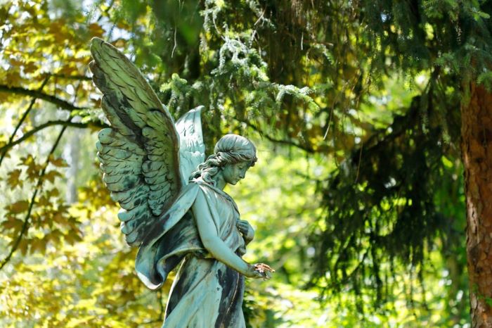 Antique Angel statue in a Cemetery