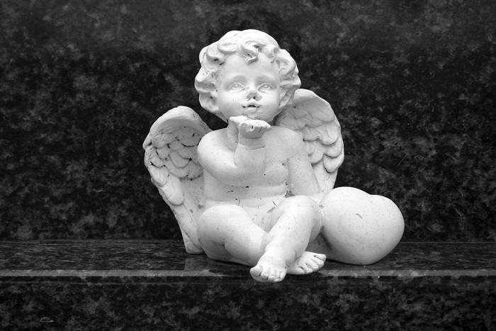 Angel statue sending a kiss
