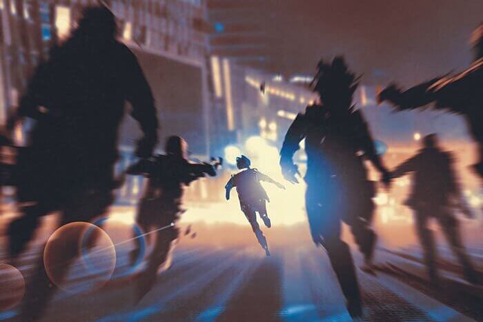 Man running away from people in the night city