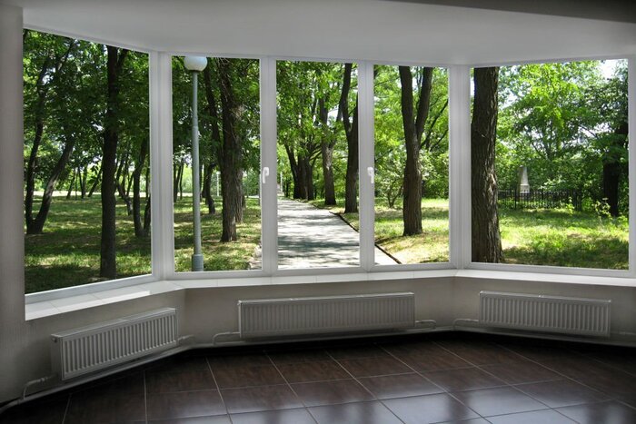 Window with view of summer city park
